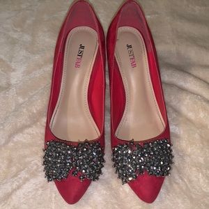Red heels with jeweled embellishment